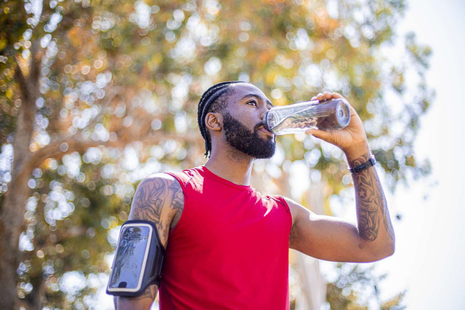 man drinking electrolytes powder